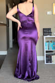 This dress was really beautiful and the material was great quality. I loved the neckline and cut of the back. Warning though, the shine of the material shows every nook and cranny and it just wasn't something I personally am comfortable wearing out. - Daryl B.