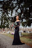 I wore this dress on my wedding day, and could not stop getting compliments. Fits perfectly, was a little long but I'm super short. The arms weren't a big deal to me, they were more flexible after about an hour of being in the dress. 10/10 recommend and I'm so thankful I chose this dress! - Denise P.