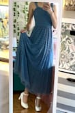 I bought this dress for my friend's wedding in May. I love how it falls over me like a curtain. It's not heavy, but it's not light. It's beautiful! I can't wait to wear it. - Caroline M.