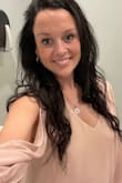 Absolutely LOVED this dress-bought it for my best friend's wedding! I got so many compliments. Unfortunately, the only full body shot I got was one my husband took of me randomly. The sleeves were 100% my fav part of the dress! - Allison M.