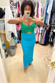 The material of this dress is thick, it's a bit heavy and it has a lot of stretch but it fits me perfectly. So unique combination of colors and they are as pictured. Going to wearing this next week to my trip to Panamá City. - Maria S.