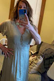 The size large fit beautifully, but couldn't zip it all the way up, too tight through the chest and back. Ordered an XL and fits beautifully. A little loose in the waist, but still looks nice! Love the material and flow! Length is excellent for us tall girls! - Kerry S.