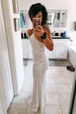 This was one of three try-ons for my elopement to Jamaica and when I put it on, and it fit like a glove, I knew that it was the one. The fabric is thick enough to provide slight compression, the sequin pattern is unreal for the price point, and the plunging neckline and slit are so sexy. The only thing that would've made this dress my <dream dress> would've been if it'd had a low back. I didn't feel the need to hem it at all; with sandals on it brushed the floor. I plan on wearing it again for my reception party with my family and friends and can't wait to feel like a beachy bride all over again. Thanks, Lulus for making the wedding dress process so easy! - Chelsea R.