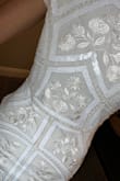 I love this dress, the detailing is beautiful and it looks much more expensive than it is! I ordered an XS, and I'm 5'5" 120lbs. It was a little loose in the waist if you're wanting a really fitted look, but I don't mind - Alyssa D.