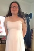 This is a beautiful dress. It fits great but is too long gonna have to get it hemmed. I plan to wear this to my wedding reception. - Crystal N.