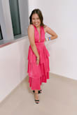 There is nothing wrong with this dress at ALL!! The way it fits to my curves and falls in all the right places is amazing. As someone who is short and always needs to get long dresses hemmed this dress keeps you from having to do that!! it falls right at my ankles where I can still wear some statement shoes and they are still seen. I will have to say if you are small busted then I would recommend getting it taken in the top just to feel more secure. - Mallori M.