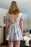 So in love with this gorgeous dress; the waist and neckline are so flattering and the colors are beautiful. Sadly I don't think I will be able to wear it to the wedding I bought it for because I'm 5'9 and it's VERY short on me. Barely covers my butt in the back and because the skirt is flowy if I was moving or dancing at all I'd probably flash the whole church. Sad because the dress is otherwise so nice!! - Alyssa