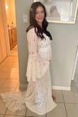 Such a beautiful dress for a beach wedding! I was 24 weeks pregnant and it had no stretch. I originally ordered a medium but had to return for a large. I was very satisfied with my dress and received so many compliments. 
5'2 148lbs - Brittany P.