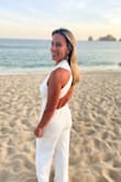 I bought this jumpsuit for beach pictures in Cabo. It fits like a glove and is so flattering. I am 5'4 and did have to hem the legs probably 4-5 inches. - Susan G.