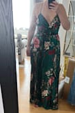Had to shorten it because I was not wearing heels to the wedding. I also sewed some bra pads into the dress but just did it by hand myself because I didn't have time to have it done properly. You definitely can't wear a bra with it. I also had a hard time keeping the sash tight enough on my waist. That said, I got lots of compliments; even from strangers who were just at the resort, not wedding guests. The material is heavy enough that it keeps its shape and the colors are stunning. They are more vibrant in the sun than in the photos. For the price, you would expect to have to make some adjustments! But it definitely doesn't look or feel cheap! I would normally get a large in Lulus but after reading the reviews, I went with a medium, which was the right choice. - Annie K.