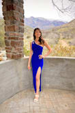 I wore this to a wedding. The dress fit great and it was so comfortable to wear. I love the cut outs and the slit, adds a bit of a sexy flair, but still keeps the dress elegant and sophisticated. - Michelle O.