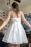 As a tall person who is a bit smaller chested I struggle with online shopping for clothes, especially dresses. This was one of two white bridal dresses I ordered from Lulus. I ordered this dress for my engagement photo shoot coming up in April and other bridal events with my bridesmaids and I cannot exaggerate enough how much I love this dress. I am obsessed with the lace top of the skirt part of the dress and it even comes with adjustable and detachable straps which I found to be sure useful and cute! I found this one which looking through a lot of the white dresses from Lulus and saw that this one had just been added. When I tell you I IMMEDIATELY and IMPULSIVELY added it to my cart, there is no exaggeration. This was hands down one of the best purchases I have ever made and I cannot wait to take photos with my fiancé in it. And even better I can wear this dress even after I get married, which is even better! - Renee L.