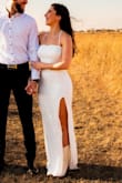 I found this dress for my engagement photoshoot and it was perfect! It alludes to my wedding dress which I found special! The slit is not too high. The straps act as a corset for the top and I like how I can decide to either cross right away or to go straight down. The length was perfect when paired with 1.5 heels. Plan 30-1 hours to iron the lace, and then iron the lining. It was super easy to iron once on high. Do not steam. - Rebecca E.