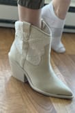 I was so excited to get these to finish my Nashville looks. Leather is really soft and beading is pretty. I'm so impressed with the quality. Overall comfortable for all the nights out.
Usually I'm a 10/41 in most brands but this one was definitely on the larger size. I'll make do with an insole but I would have preferred a full size down in a 9. I also have very narrow ankles so it's quite loose around me, very wearable! - Ainsleigh D.