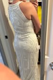 The dress far exceeded my expectations!! The beadwork, embroidery and sequins were really high-quality. Unfortunately, there was only an XL and I am a solid L or even M. I took it to a seamstress to see about getting it taken in but with all of the beadwork, it wouldn't have been cost effective.
The biggest fit issue for me was the gaping at the bust. I am not small chested, but there was quite a bit of room, I think in the correct size this would have been minimized. I also found the neckline difficult to wear with a bra. I am 5'3" and the dress was very long, I planned to have it hemmed at the seam at the knee for our casual wedding.
I ended up finding another Lulus dress with identical beadwork and different neckline in my size. - Melanie T.