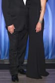 I love this dress; great quality, and comfortable, no bra is needed and it fits like a glove! Definitely true to size, however, it is pretty long. I'm 5'7 and wore 4" block heels and it still skimmed the floor. Other than the length, it's perfect! - Donna H.