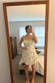 I bought this dress to wear at my graduation and I LOVE IT! It is made with high-quality material and it's so comfy. Because of the straps and the tie-back, the dress is easily adjustable. I have a short torso and a bigger chest, so I typically have trouble finding flattering dresses, but this one was a hit! - Grace S.