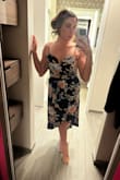 Barely had to do hair and make up. This dress stole the show. Perfect for a spring wedding guest. I'm between a small and medium and went with the medium. I didn't need to wear a bra as the straps are adjustable. It hit my little mommy pooch perfectly and didn't need to wear shape wear, either. - Alexandra H.