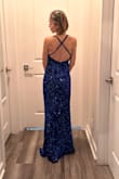 I love it!! It's so glamorous. I can't wait to wear at dinner time for our cruise. It's a little bit heavy but fits perfectly and the sequence does not scratch at all. - Juvelyn W.