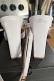 When I got these in the mail, they came with scuffs on the shoes and little blue marks on the shoes. Box was rather damaged getting to me, and there was nothing in the box but the shoes no paper to help the packaging, or anything - Abigail M.