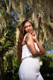 I love jumpsuits. I had a photoshoot with my best friends and we had to wear white. This was the perfect outfit! I received so many compliments from my friends. I bought a size medium and the fit was just right. - Kimberly G.