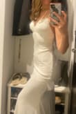 It's a really good buy. Heavy fabric, so it falls nicely and is forgiving with skin imperfections. Lacing in back lets you adjust tightness/fit. Fabric has some stretch so it fits well over the hips. Overall very happy with the dress! - Bringme T.
