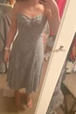 This fits perfectly! Super flattering the material has some stretch to it and then length is amazing! The small hints of silver in it adds such a beautiful detail. It's gonna be perfect for the wedding I go to - Emily F.