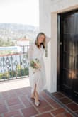 I loved these sparkly satin slippers. I bought them for my wedding. They were perfect because we did a ton of walking around for pictures. They also go great with a pair of jeans to sparkle up a casual outfit. - Sophia D.