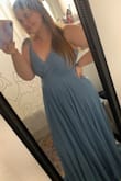 I was very scared ordering a dress online without trying it on first but I just went with a normal size that I would wear in anything else. It shipped very quickly I got it within a few days of placing my order. It looked a little large before I tried it on, but once I put it on it fit perfectly. I am 5 ft 2in so the dress was pretty long on me and I didn't have time to hem it before my event, I wore 2-inch wedges and it was still pretty long. But it didn't stop me from having a good time and getting tons of compliments on it! - Amber C.