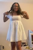 I was on the hunt for my grad dress and I instantly fell in love with this dress! I love the puff sleeves and the cute flower embroidery all throughout the dress! I didn't want to wear a generic white grad dress for my grad photos so I'm extremely happy I bought this. 
For reference, I am typically a size 4/6 and I am a 36C. I got a medium in the dress and the top fit me just right. I didn't want to size up to a Large as the bottom of the dress is super flowy for me already (I didn't want it to fit oversized on me) but keep this in mind if you purchase! Material is not stretchy!!!

Absolutely cannot wait to take my grad photos in this> - Ivette R.
