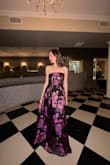 I really enjoyed wearing this dress to a recent event - it felt comfortable and lightweight! I do think it runs fairly large - normally my bust would be super tight in an XS but this was a bit loose on me. It's also very long - be prepared to wear tall heels or the skirt will drag on the floor (I didn't care and opted for flats haha). The material doesn't feel super high quality but I think the color and shine look good enough, especially in darker environments. It did come fairly wrinkled but it smoothed out nicely after steaming. I think it's great overall for the price! - Sarah F.
