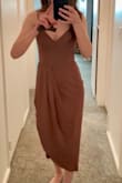 I'm so excited that this dress is equally beautiful in person as it is in the pictures. I got the mauve purple and was afraid it'd wash me out; I'm definitely pale and it doesn't wash me out at all and is a very pretty color. This dress is flattering on all body types; if you're busty I'd recommend sizing up. It's classy and is made with quality material. It can be dressed up or down- I'll be wearing it to a wedding & couldn't recommend it more. If you're unsure like I was, don't be. Get it!! - Hannah H.