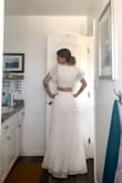 I ordered this dress to use as my wedding dress! I measured myself and ordered an extra small and it fits flawlessly. I love how elegant it looks while also not being over the top! I am so excited to wear it on my wedding day this weekend! - Emily M.