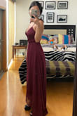 It looks amazing, the straps are adjustable so you don't have to worry about your chest showing. Adjusting the waist was kinda tricky but I think I managed. I just have to tailor it because it is too long for me but I'm short anyways so no problem. Overall I'm very happy with the price and quality :) - Montserrat V.