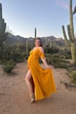 This ended up being a beautiful maternity dress! The only issue was I had to sew a clasp in the bust area because it ran large. I bought my pre-maternity size and still fit well. - Aubrey B.