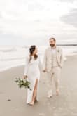 I chose this as my wedding dress and it was the best I could have asked for! I did get the bottom and sleeves hemmed as they were slightly long but it fit like a glove! Truly felt so beautiful on my special day! - Alanna U.