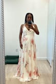 Love this dress!
The fabric is heavy and high quality. It is too long for my 5'2" frame, so will need to alter it.
The button at the bust is too tight for me, so I will also have the button location altered or removed altogether.
I'm wearing it without a bra in the pictures, but planning to buy a strapless U-shaped bra for when I'll wear it as a wedding guest. - Lensa M.
