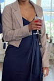 I like the blazer, but even with a smaller size the front fit really big. I put safety pins in for a better fit. The sleeves were long but perfect. - Terrekia A.
