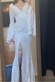 I bought this dress hoping to wear it to my wedding. I got a size SMALL and it fits perfectly. Obviously it needs some alteration because my chest is on the small side so it's a little loose but other than that everything is perfect. - Elle J.