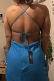 I'm 5'4 and it's too long by about 4 inches, but it fits everywhere else. It's not right around my stomach area and there's no room by the zipper. You can tighten it just around your bust without tightening the stomach or affecting your shoulder straps. It flares a little bit at the very bottom with gives it a Mermaid like shape. - Mali H.