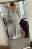 This dress was fine, I just wasn't crazy about it. I ordered a medium and it was true to size but not super flattering, I think it probably looks better on smaller people. Material was pretty good, I think it looked well made, just not for me. - Amy A.