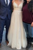 I had to find a dress in about a week for my wedding, and I ordered this dress and paid extra for shipping. It came faster than expected! And it fits perfectly, so luckily I didn't need to do any alterations (I'm small-chested so only think I still needed help with was the cup area)
Pretty, simple, everyone talked about the sparkle on tulle which I was afraid would look like a prom dress but it didn't it's Surprisingly subtle. - Katie B.