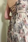Very beautiful, formal dress I bought to wear as a guest to a wedding. It's very long which works great for me since I'm 5 ft 10in but anyone else will probably need it hemmed. The lace up corset top is so pretty and flattering. - Danielle F.