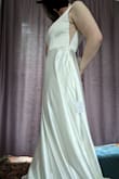 The mesh v under the arms is classy sexy in a way I loved. Very long, will need to be hemmed for anyone under 6', I think, but the satin looks great and it has pockets! - Caitlyn S.