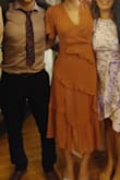 This dress was comfortable to wear. I was a bit large in the chest and shoulders for me.  I used a safety pin to help tighten it up a bit. - Sarah Q.