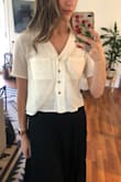 This top is so cute with so many different outfits! Wore it to work with a skirt, threw on with jeans, paired with cute shorts& anything goes. It is slightly see through, so either be ok with an under tank or showing your bra a little. - Daylee G.