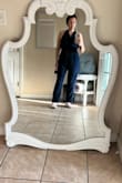 When I tried it on, I noticed that the middle area seems too bulky and not flattering at all! It looked like I had a bump on my stomach. The fabric is also too thick and not lightweight as it seems in the picture. - Andrea R.