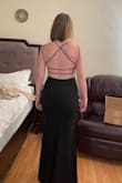 I ordered a half dozen dresses and none could compete with this one. The back is beautiful and it gives some cleavage while still being classy. I got a lot of compliments and felt beautiful in it. Would HIGHLY recommend. - Rachel B.