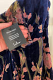 This dress is stunning, there is no denying that, but it was clearly a return that had been worn. I'm not sure how the Lulus employees thought this dress was in selling condition. The perfume smell from the previous owner was overwhelming and there were tears in the dress. The tag that needs to be left on for return was obviously crumbled (as if someone wore it). 

Very disappointing that the dress wasn't vetted better. I have a wedding to attend in a week and I can't wear this now. - Kaitlin D.