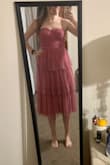 LOVE this dress. It's so fun and feminine. Love the color. I wore this without a bra and it worked great. Got lots of compliments at the event I went to. I took one star off because one of the straps was sewed on weird and the boob cup was folding over so I had to sew it on better myself. I'm excited to wear this dress again! - Cassandra G.